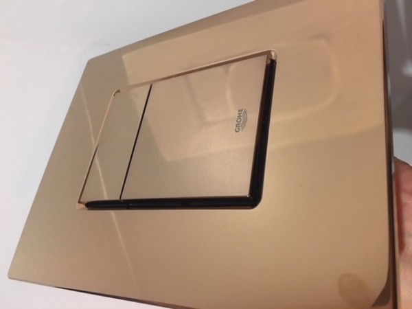 Piekny przycisk spłukujący Grohe Skate Cosmopolitan warm sunset-image_Grohe_38732da0_1